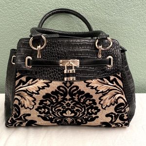 Designed in New York by Sharif.